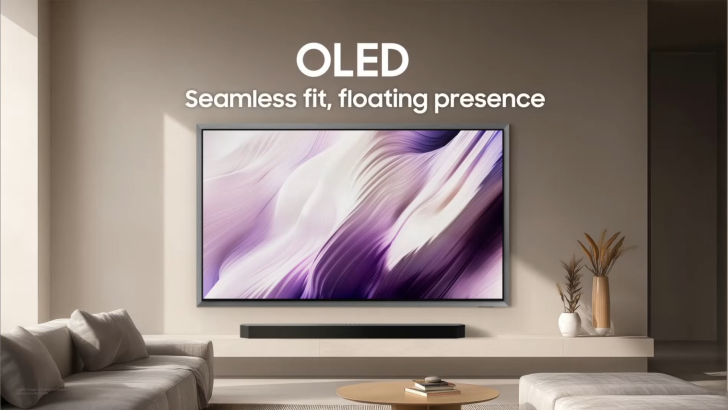 A wall-mounted OLED TV in a modern living room with the words 'Seamless fit, floating presence' displayed above it.