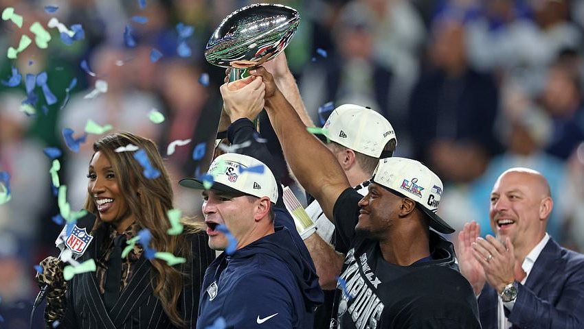 Seahawks stars begin wild celebrations after their Super Bowl win as devastated Patriots players flee the field