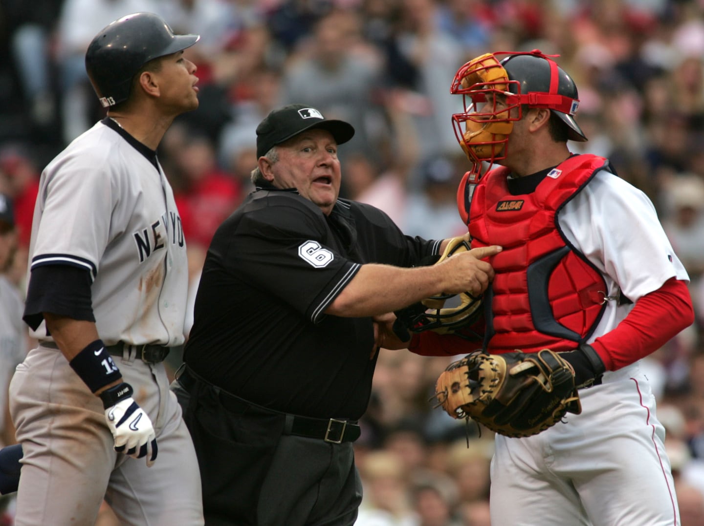 Legendary umpire Bruce Froemming was literally the man in the middle just before the famous 2004 scrap between Red Sox captain Jason Varitek (right) and Yankees third baseman Alex Rodriguez. 