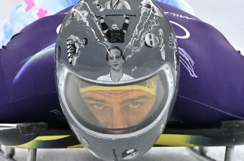  Ukrainian Olympian disqualified over images of war dead on his helmet : NPR
