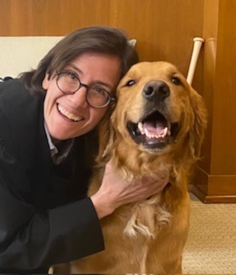 Judge Ana C. Reyes and her dog, Scout.