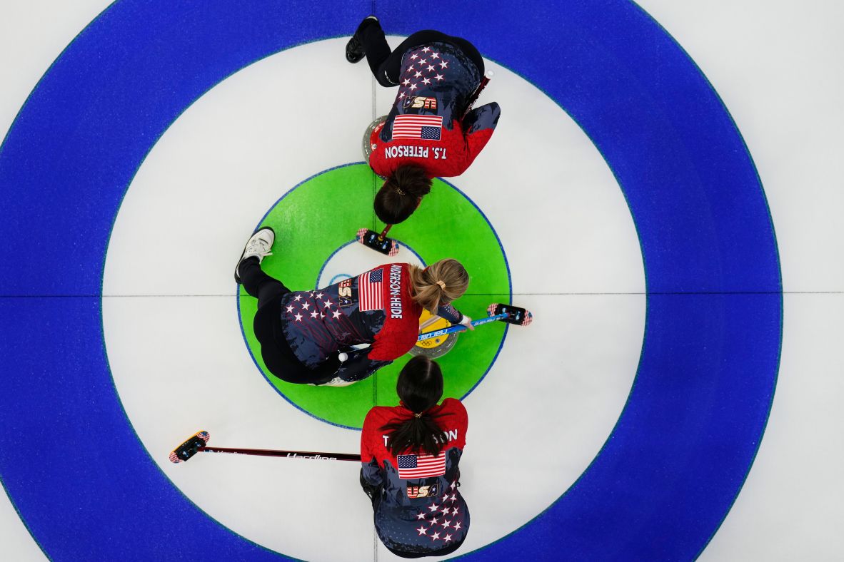 US curlers Tabitha Peterson, Tara Peterson and Taylor Anderson-Heide compete in a round-robin game against Canada on February 13.