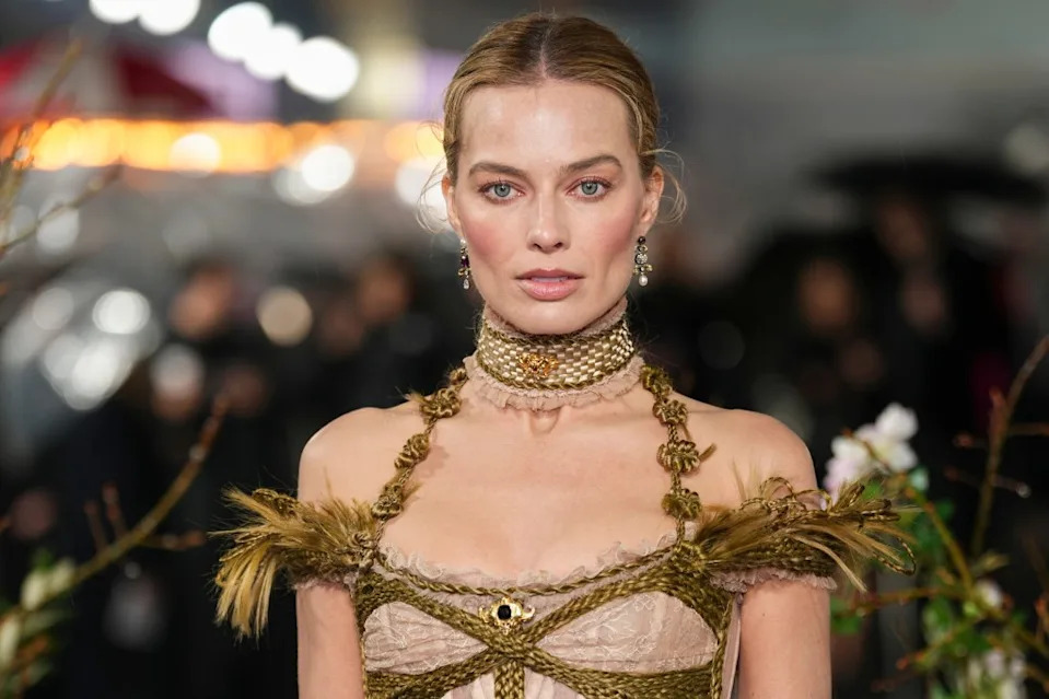 The look’s built-in braided choker complemented her antique-inspired bracelet. Scott A Garfitt/Invision/AP