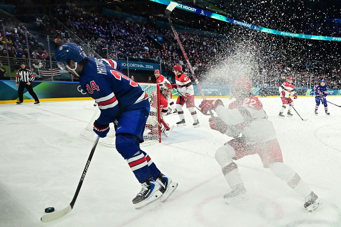Team USA's Auston Matthews and Denmark's Markus Lauridsen vie for the puck during a hockey game on February 14.