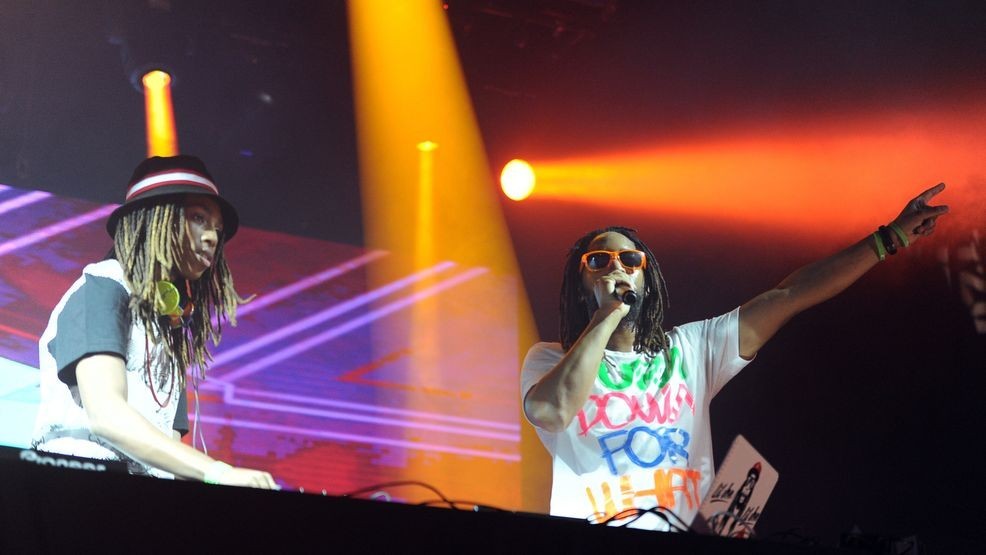 HOLLYWOOD, CA - MARCH 22:  Nathan Smith aka DJ Young Slade (L) and Lil Jon perform onstage during 97.1 AMP RADIO's Amplify 2014 concert at the Hollywood Palladium on March 22, 2014 in Hollywood, California.  (Photo by Kevin Winter/Getty Images for CBS Radio, Inc.)