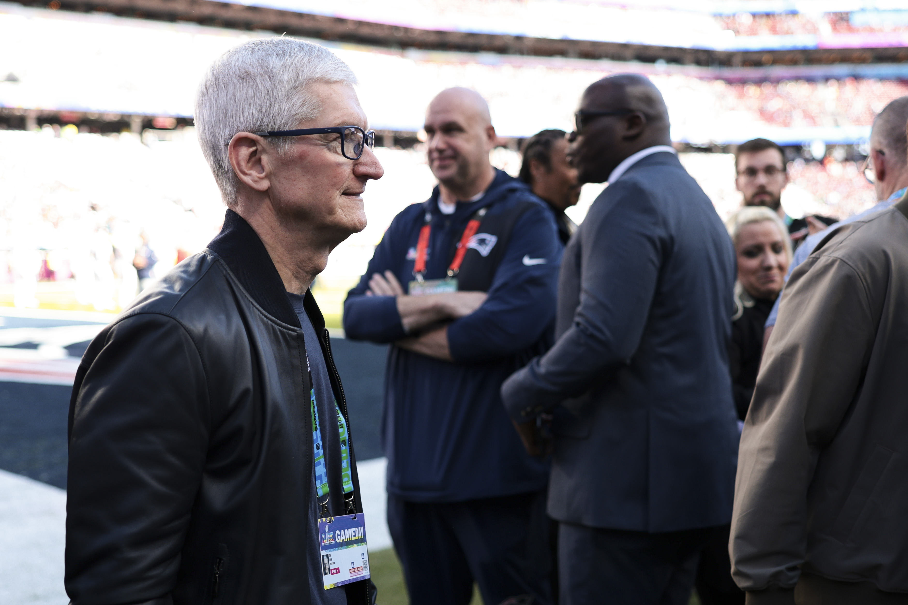 CEO of Apple Tim Cook walks on the field prior to Super Bowl LX between the New England Patriots and the Seattle Seahawks at Levi's Stadium on February 08, 2026 in Santa Clara, California.