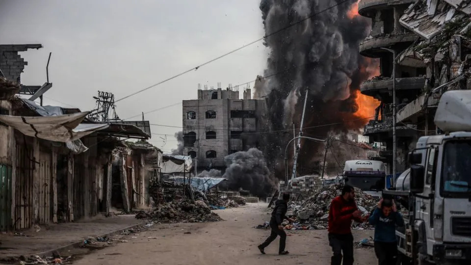 Smoke and flames rise after an Israeli attack on a three-story building in the Zeitoun neighborhood in Gaza City on Friday, February 6, 2026. - Ali Jadallah/Anadolu/Getty Images