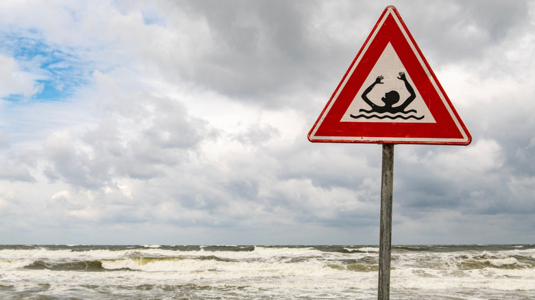 drowning danger sign at beach