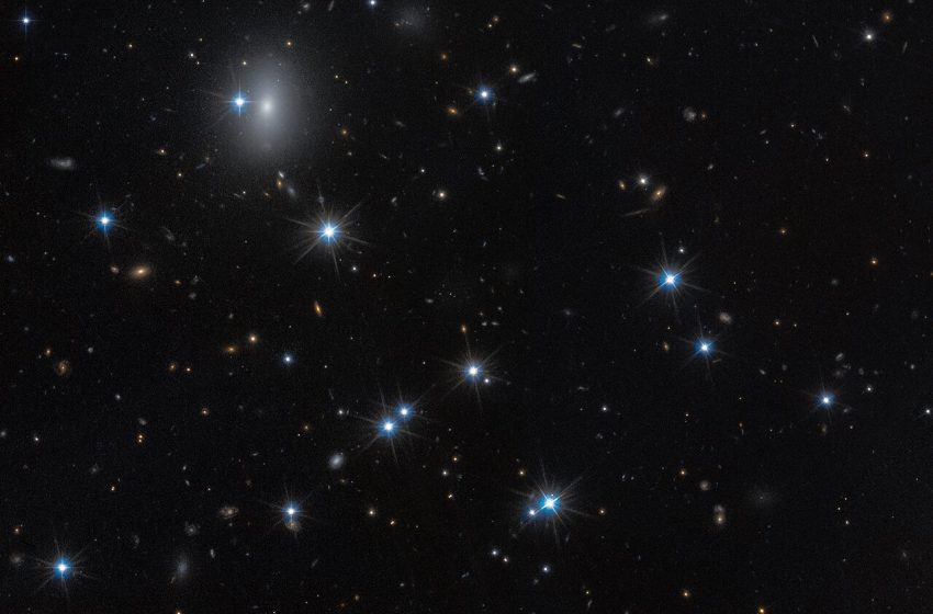  Hubble identifies one of darkest known galaxies