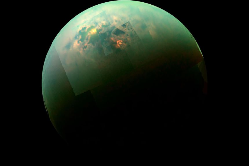 A view of Titan from Cassini, with the sun illuminating the moon's north polar seas.