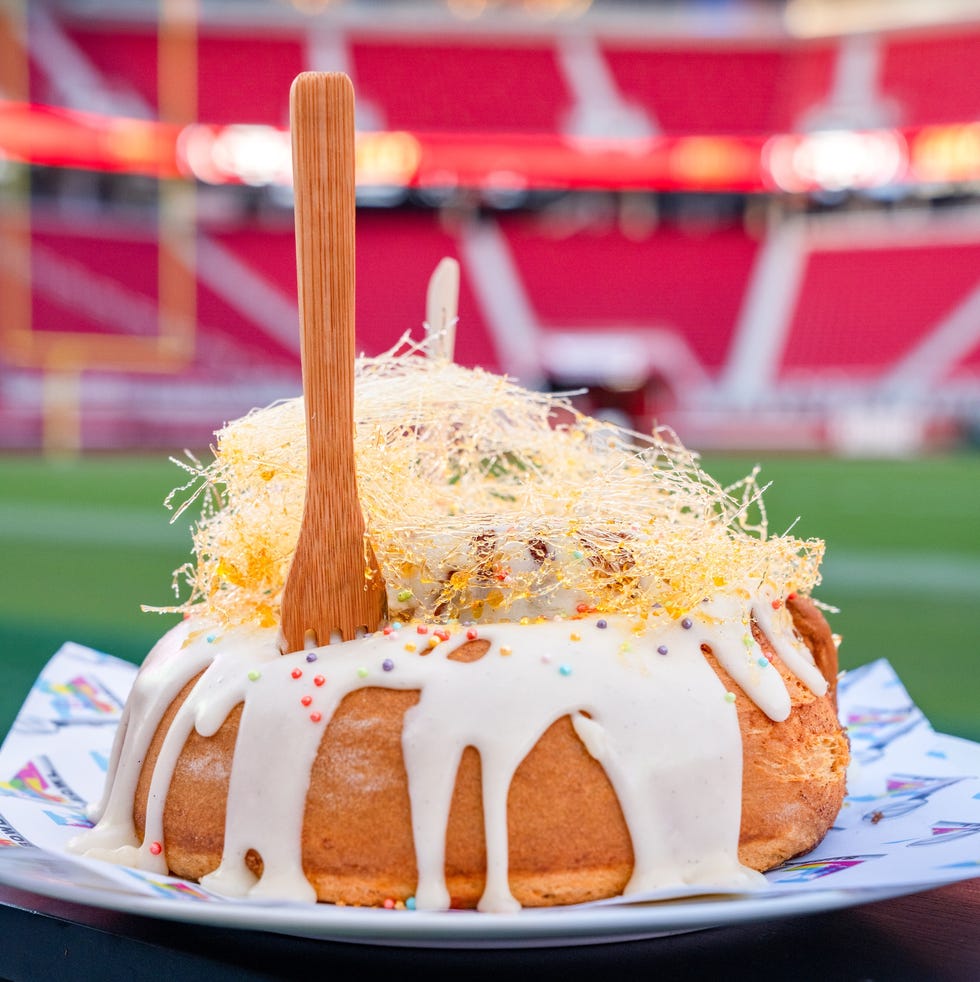 decadent dessert featuring cake with frosting and decorative elements