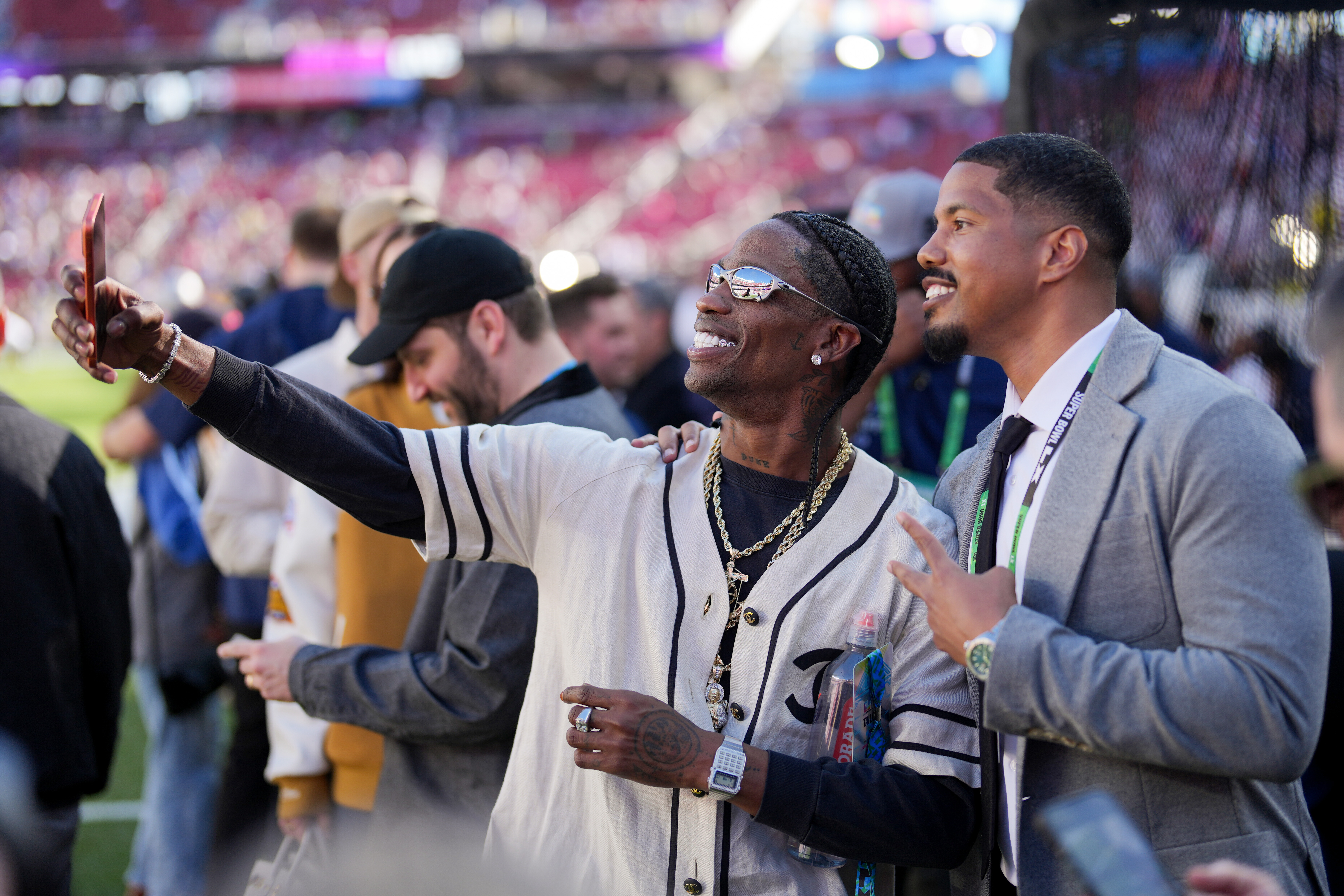 Travis Scott on the field prior to Super Bowl LX between the New England Patriots and the Seattle Seahawks at Levi's Stadium on February 08, 2026 in Santa Clara, California.