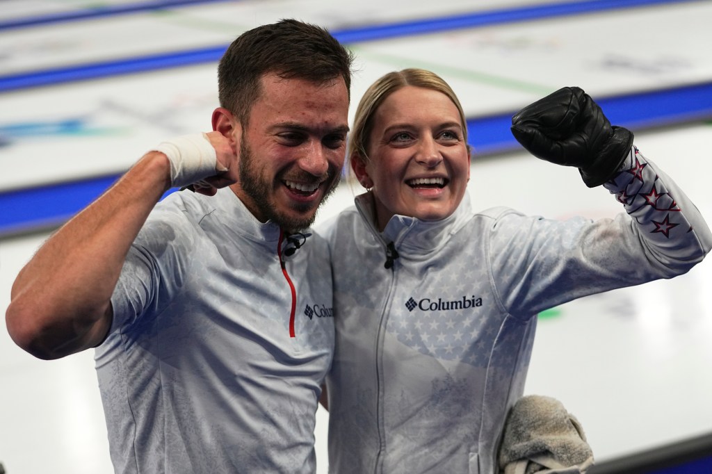 United States' Korey Dropkin, left, and United States' Cory Thiesse react following their semi-finals round of the mixed doubles curling match against Italy, at the 2026 Winter Olympics, in Cortina d'Ampezzo, Italy, Monday, Feb. 9, 2026.