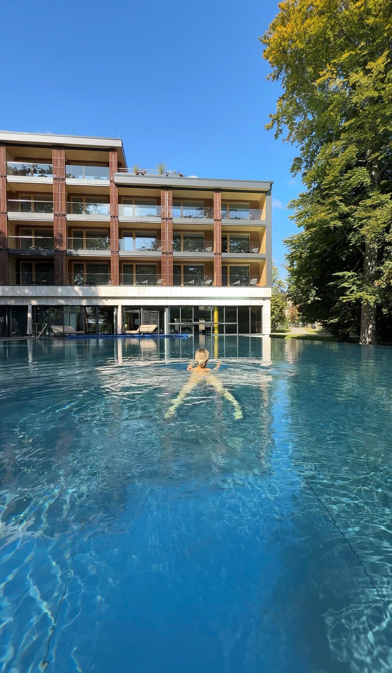 Claire Ezekiel swimming in the huge pool at Buff Medical Resort in Germany