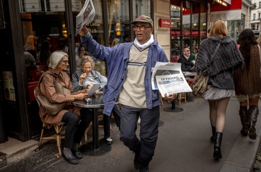  France honors last newspaper hawker in Paris with knighthood : NPR