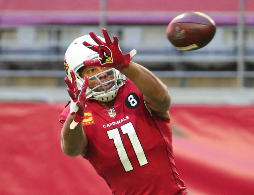 Larry Fitzgerald warming up before playing against the Philadelphia Eagles in December 2020.