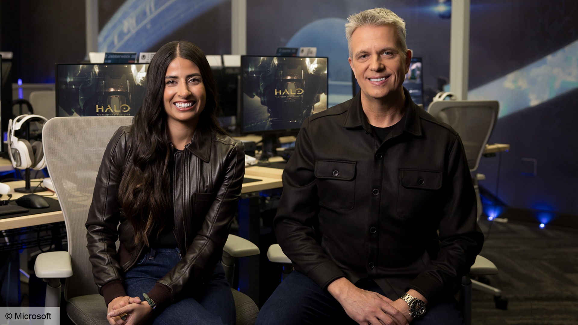 Microsoft Xbox: Asha Sharma and Matt Booty sitting in a room full of PCs