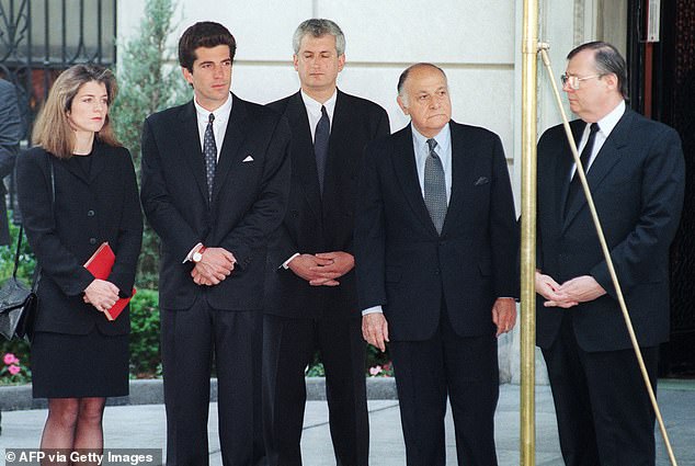 In many of the pictures from Jackie's real funeral, JFK Jr. (second from left) is seen with  Caroline Kennedy Schlossberg (left) and other family members and close friends