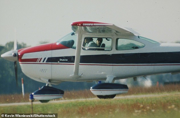 JFK Jr. and Carolyn pictured in his plane in 1998