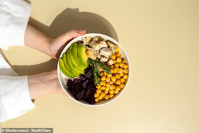 Beale told the Daily Mail the 'easiest' way to implement beans into your diet is to start small and add them to familiar foods, such as putting black beans on tacos or topping salads with chickpeas or lentils (stock image)