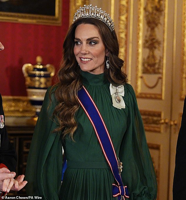 The Princess of Wales dazzled in a green evening gown by Andrew Gn with her favourite Lovers' Knot Tiara and earrings belong to Queen Elizabeth II