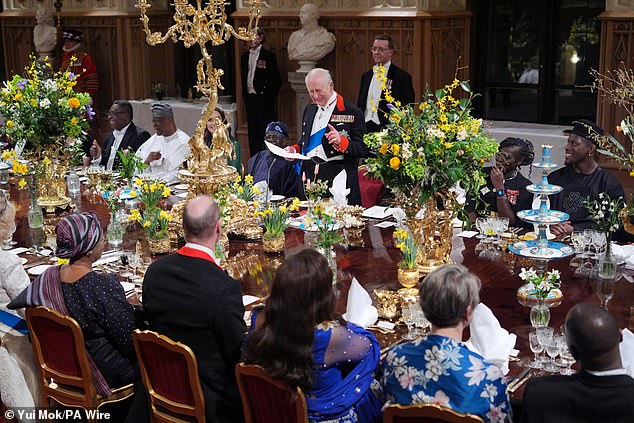 Charles made a speech before dinner, which was expected to be served on the highly decorated table at around 9pm