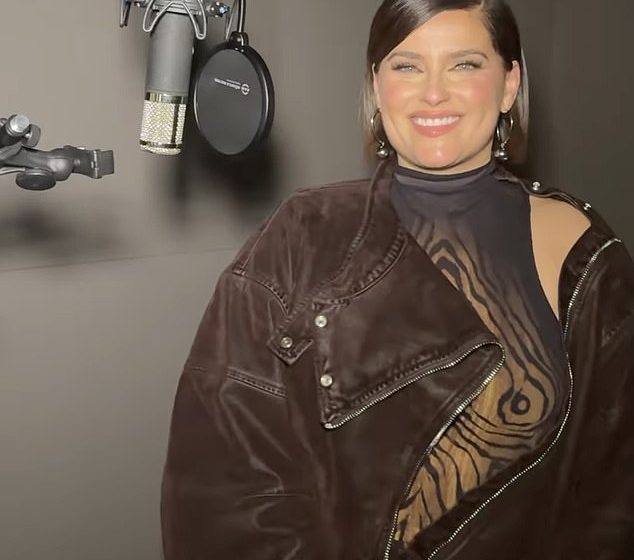  Nelly Furtado returns to music as she flaunts her curves in studio clip after quitting performing amid body shaming attacks