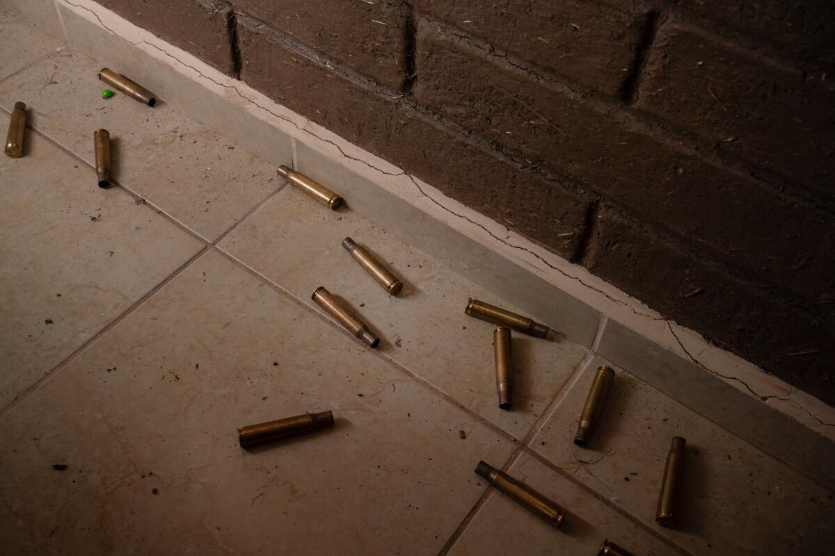 Spent shell casings scattered across the floor