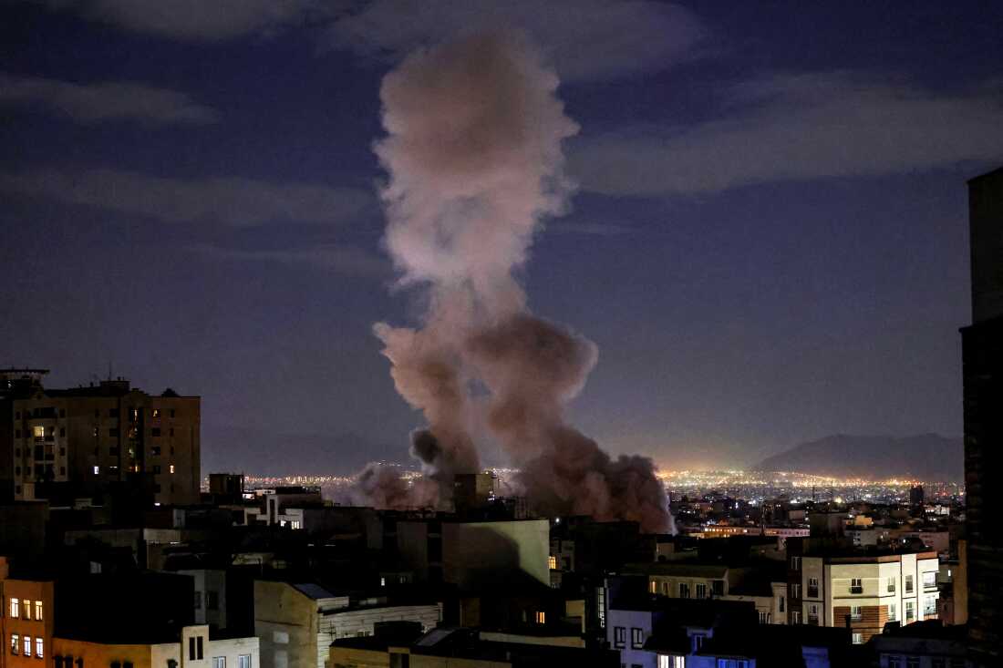 A smoke plume rises following a missile strike on a building in Tehran on March 1, 2026. The United States and Israel launched strikes against Iran on February 28, killing Iran's supreme leader and top military leaders, prompting authorities to retaliate with strikes on Israel and US bases across the Gulf.