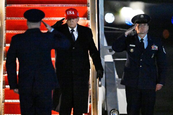 President Donald Trump arrives on Air Force One, Sunday, March 1, 2025, at Joint Base Andrews, Md. (AP Photo/John McDonnell)
