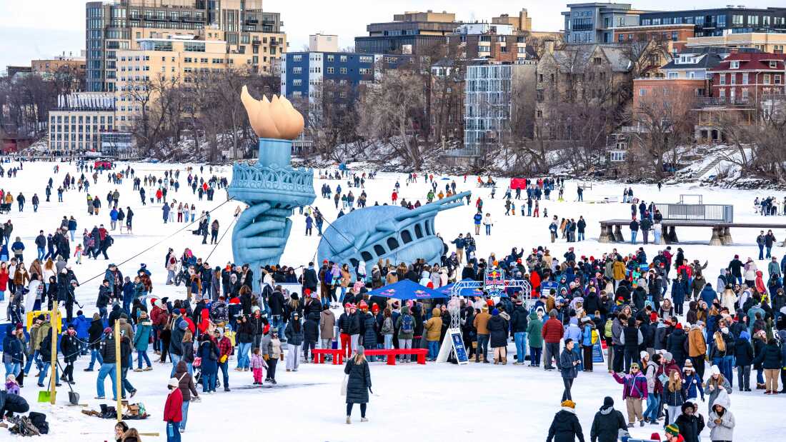 People gather on Lake Mendota near an inflatable Statue of Liberty crown and torch at the Winter Carnival at UW-Madison on Saturday, Feb. 7, 2026, in Madison, Wisconsin.
