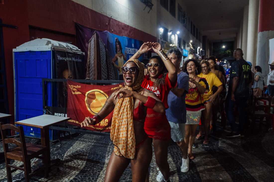 Members of Puta Davida, a feminist collective advocating for the labor and human rights of sex workers, take part in the final march of a public action during Carnival in downtown Rio de Janeiro, Brazil, on Feb. 14, 2026. The event reclaimed the historic Mangue area — once officially designated as a prostitution zone in the early 20th century — and sought to assert political representation, collective memory and labor rights for sex workers. I chose this image because it shows how sex workers intervene in one of Brazil’s most symbolic cultural moments to challenge their own representation. By organizing during Carnival, the collective transforms a festive space into a platform for political visibility and historical accountability. Previously published in Brasil de Fato, Feb. 16, 2026. Link: https://www.brasildefato.com.br/2026/02/16/antes-de-desfilar-na-sapucai-prostitutas-de-varias-geracoes-ocupam-o-edificio-balanca-mas-nao-cai-para-discutir-memoria-e-representacao/