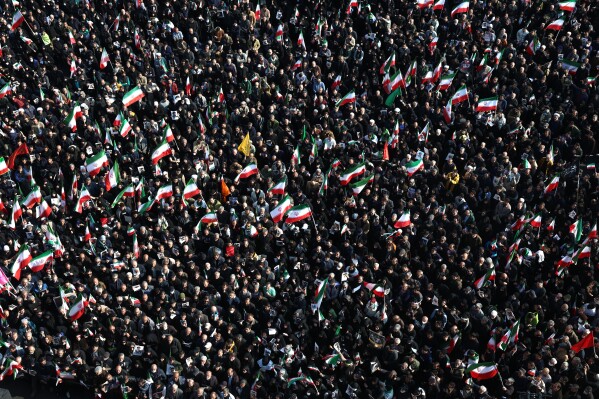 People gather in a rally to support Ayatollah Mojtaba Khamenei, the successor to his late father Ayatollah Ali Khamenei as supreme leader, in Tehran, Iran, Monday, March 9, 2026. (AP Photo/Vahid Salemi)