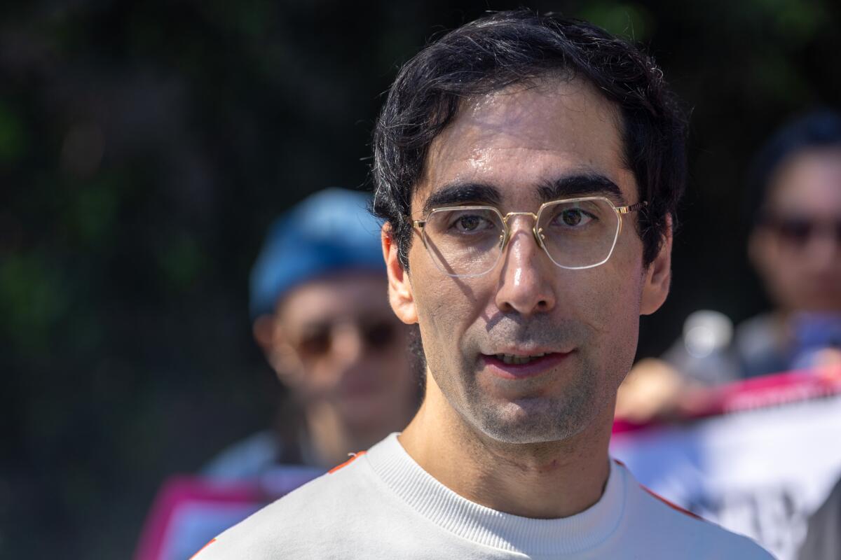 A man wearing eyeglasses.