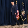 President Trump walks away from a lectern bearing the presidential seal after a press conference in Miami on Monday.
