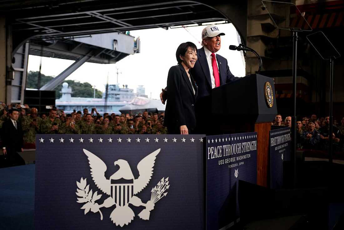 Japanese Prime Minister Sanae Takaichi and U.S. President Donald Trump speak to troops aboard USS George Washington at Fleet Activities Yokosuka on October 28, 2025 in Yokosuka, Japan.