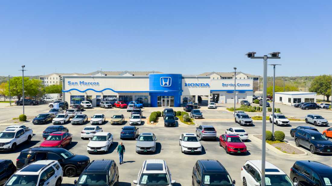 A Honda dealership is seen on March 12, 2026, in San Marcos, Texas. About 60% of the Honda vehicles sold in the U.S. last year were assembled in the United States, according to Honda, which means they could be eligible for a new tax provision allowing buyers to deduct the interest paid on their auto loans.