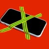 A banned smartphone is taped down to a red surface with two strips of adhesive tape that cross like an X over the phone's screen. The strips of tape have alternating yellow and green stripes on them.
