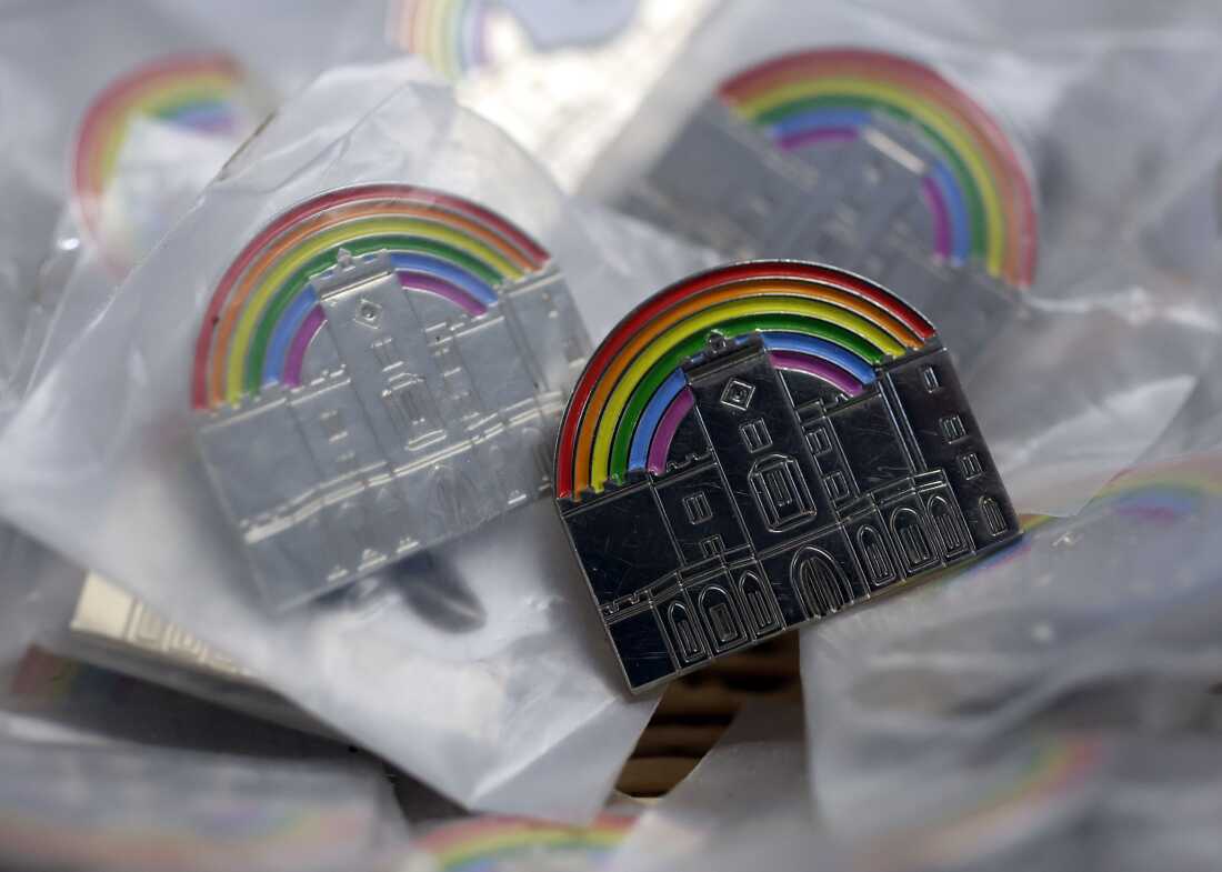 The LGBTQ+ rainbow is pictured above a mini version of Powderham Castle on a badge in Devon, Britain, July 21st 2025. 