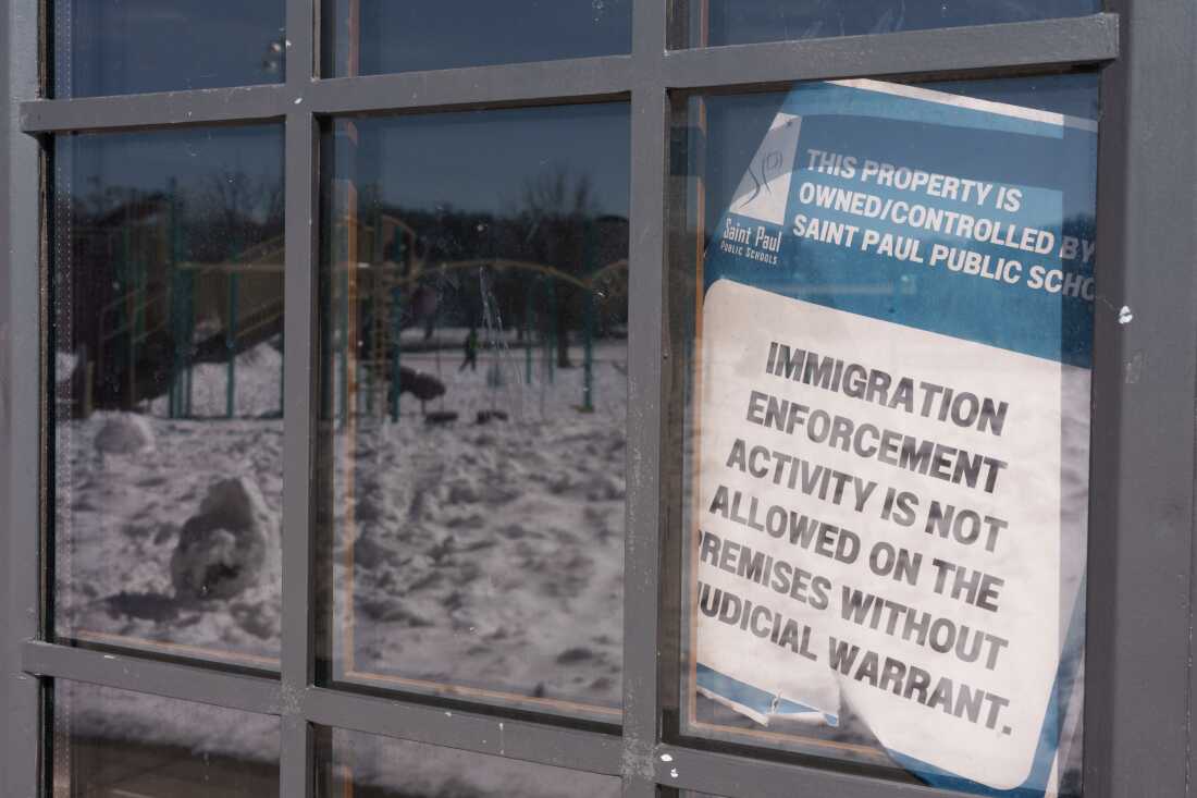 Signage bars federal immigration agents from entering the elementary school without a judicial warrant.