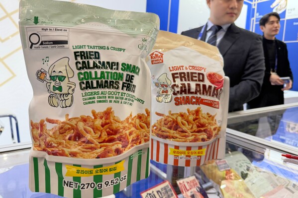 Fried calamari snacks are displayed at the Seafood Expo North America in Boston on March 17, 2026. (J. M. Hirsch via AP)