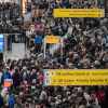 People wait in a TSA line at the John F. Kennedy International Airport on Sunday in New York City.