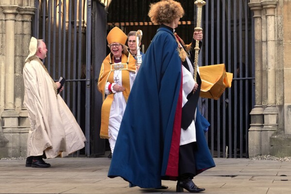 Sarah Mullally leaves the Cathedral after the Enthronement Ceremony installing her as archbishop of Canterbury in Canterbury, England, Wednesday, March 25, 2026, the first woman ever to lead the Church of England. (AP Photo/Alastair Grant)