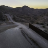 From an aerial view, the U.S.-Mexico border fence ends with a gap on Jan. 20, 2025 near Sasabe, Ariz. Republicans' tax and spending bill includes $46.5 billion for border wall projects.