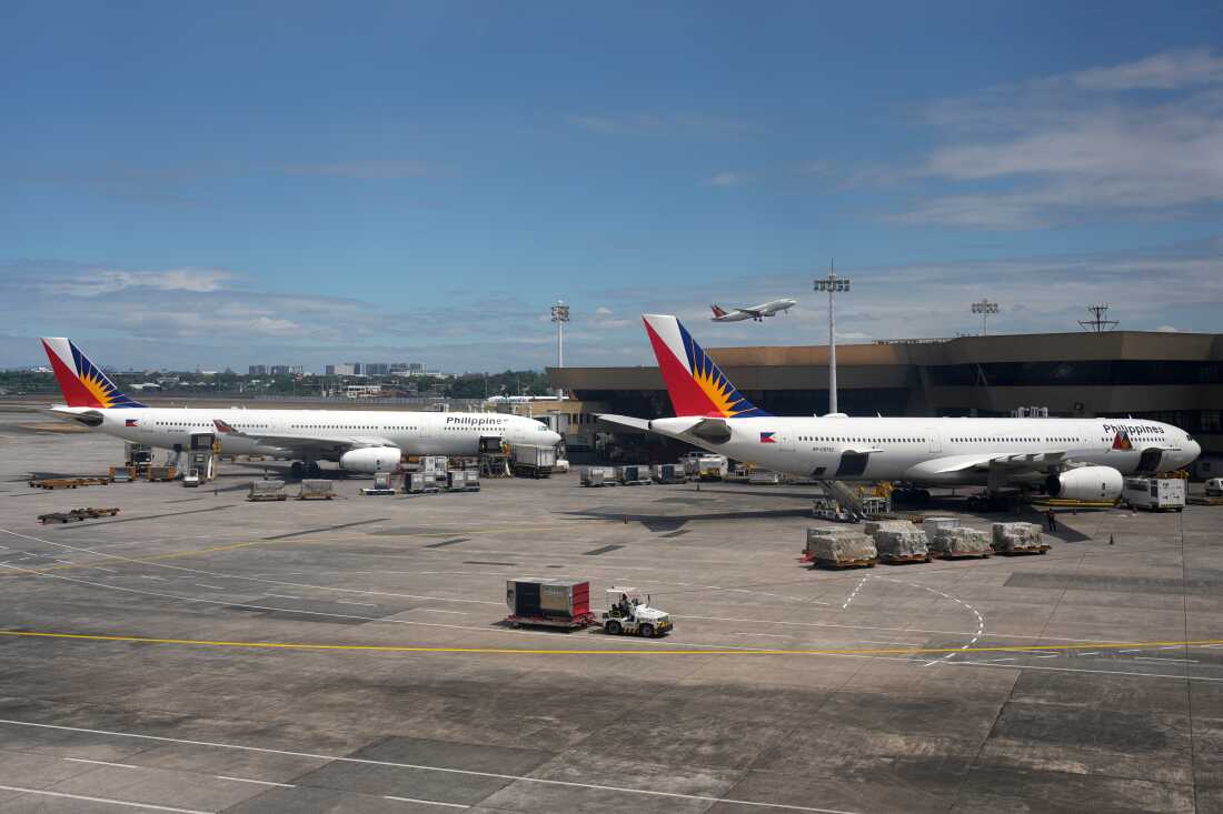 Philippine airlines parked at Manila's international airport, Philippines on Wednesday, March 25, 2026.