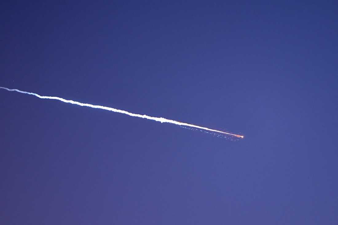 Rocket trails are seen in the sky above the Israeli coastal city of Netanya amid a fresh barrage of Iranian missile attacks on March 28, 2026.