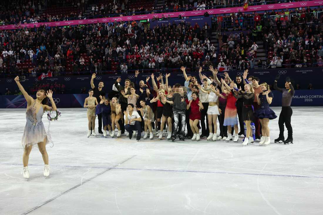 Kaori Sakamoto takes a selfie with fellow figure skaters at the Olympics exhibition gala in Milan last month.