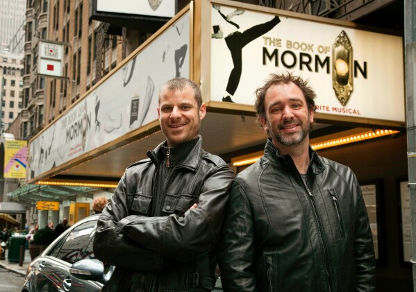 Trey Parker, right, and Matt Stone, co-creators of the Broadway show "The Book of Mormon," pose for a portrait outside the Eugene O'Neill Theatre in New York on March 16, 2011. (AP Photo/Victoria Will, File)