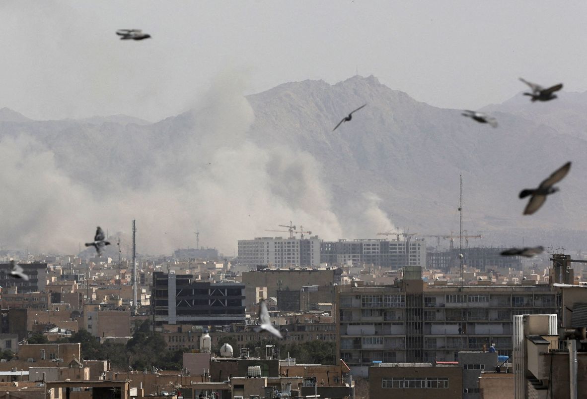 Birds fly overhead after an airstrike in Tehran on February 28.