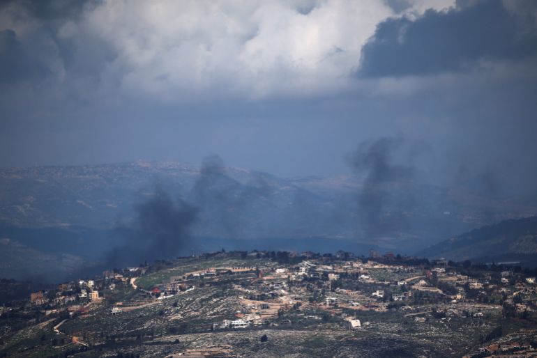Smoke rises from a village in Lebanon following an Israeli strike, amid escalation between Hezbollah and Israel,